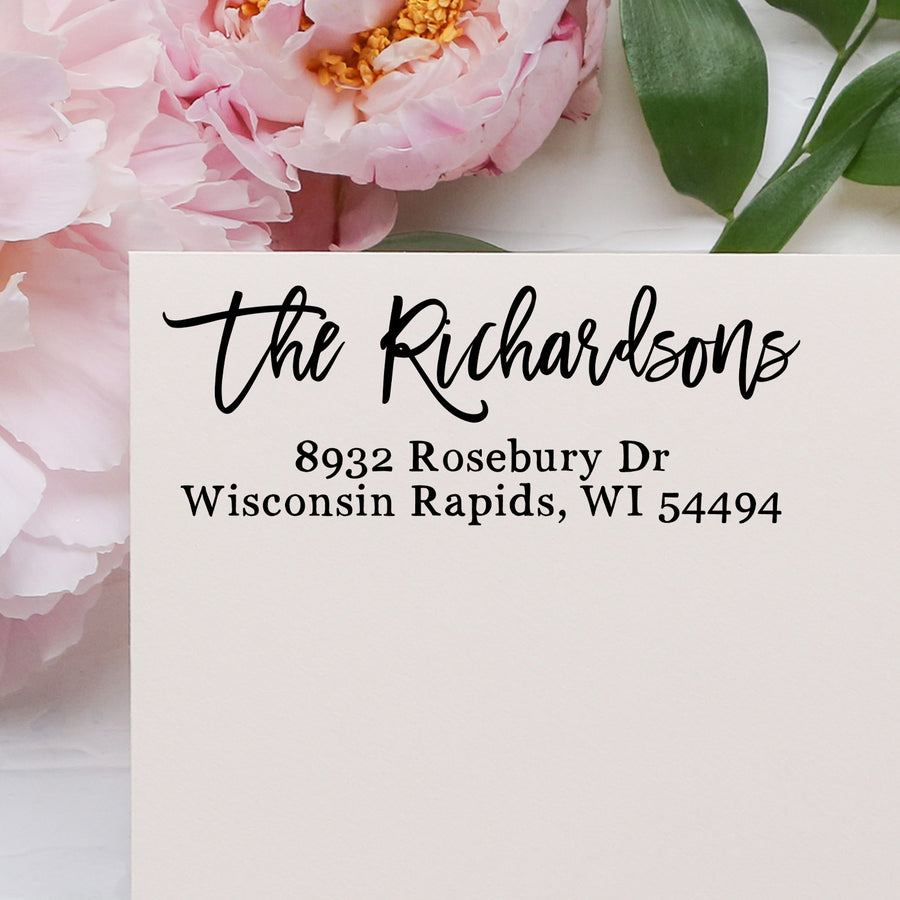 Address card with 'The Richardsons' and address details on a floral background